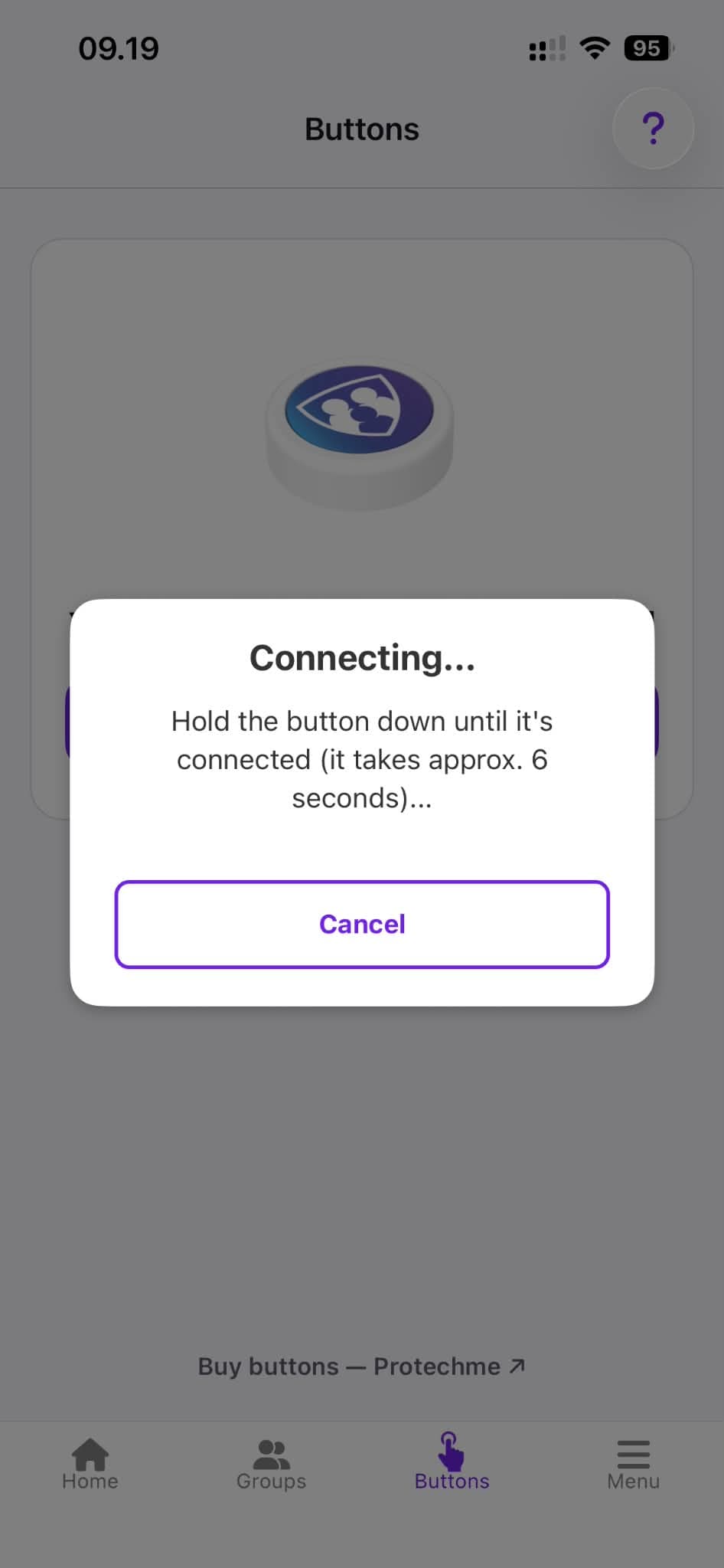 The app showing "Connecting..." while the button is held down